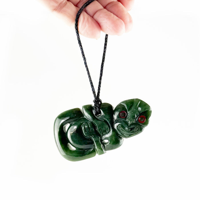 Genuine Greenstone Māori Tiki Necklace with Red Eyes - ShopNZ